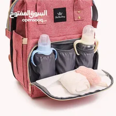  10 وصل حقيبة ظهر الام مع سرير  للاطفال 2×1  حقيبة مميزة خاصه للامهات حيث تتميز بتصميم مليئ بمساحات كبير