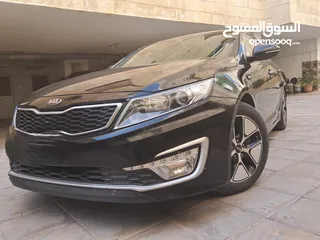  1 كيا مميز هايبرد وارد كوريا بحال الوكاله دهان الوكاله خاليه من الحوادث Kia K5 Hybrid 2014