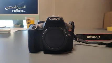  1 Canon 1300d (  بحالة وكالة استخدام 3 مرات مع كامل اغراضها وعدستين)