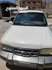  6 كيا سبورتاج موديل 2000 لون ابيض ماتور 2000 توماتيك