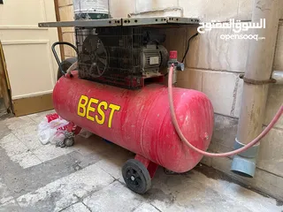  2 Air compressor and tire removal racks for sale بيع رفوف وكمبريسر وجهاز فك الاطارات