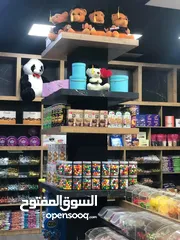  8 محل تجاري ع الشارع الرئيسي منطقه حيويه