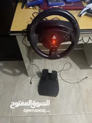  1 PlayStation steering wheel and pedals