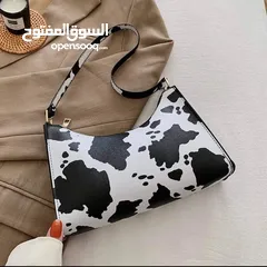  1 حقيبة نسائية