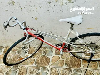  4 بسكليت سباق ياباني عجل رفيع غيارات شغاله تمام سبعه غيار بسكليت طلقه
