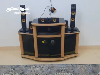  3 LG speaker with table