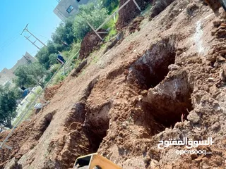  15 حفارة/ جرافة جي سي بي