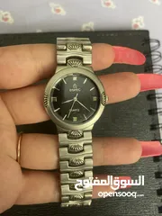  8 espec ساعة فضية كوارتز ستانلس ستيل ضد الماء صنع في الصين سير على شكل صدفات بحرية الداخل أسود