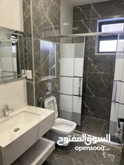 11 شقه طابق اول في احلى مناطق ضاحية الرشيد قرب دوار اقرا تشطيبات سوبر ديلوكس