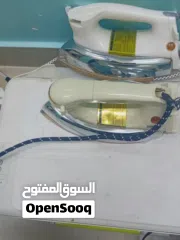  6 مكواة ملابس 2 جيده معه طابعه