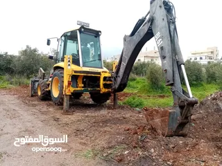  1 حفارة/ جرافة جي سي بي