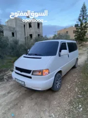  1 باص كرافيل للبيع موديل 2000 دهان جديد وغرفة جديدة كراسي منجدة جلد غرفة كحلية جنط باسات تعتيم كامل