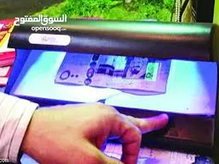  6 جهاز  كاشف  العمله المزوره  و اظهار العلامات  المائيه