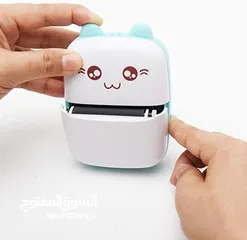  2 • طباعتك الصغيرة والسحرية! طابعة Mini Sticker Printer هتخلي كل يوم مغامرة جديدة. صورك وملاحظاتك هتتح