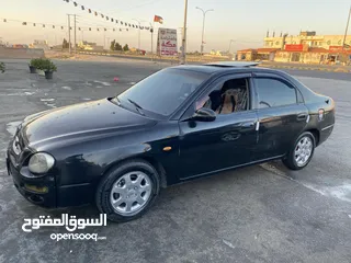  1 كيا شوما 99 مرخصه