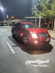  1 Cadillac SRX 2010, GCC. Good condition, fully loaded with panoramic roof and original paint