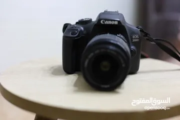  5 كاميرا كانون 2000D + عدسة 18-55mm  بحالة ممتازة وبسعر مغري جدا