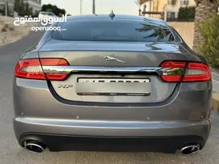  9 JAGUAR XF 2014 ( مخزنة )وارد الوكالة فل كامل عداد 15 الف كم فقط فحص كامل بدون ملاحظات