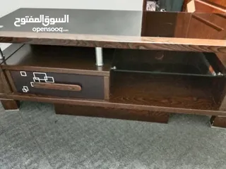  1 طاولة تلفزيون خشب ماليزي ممتازه حجم كبير مع درج