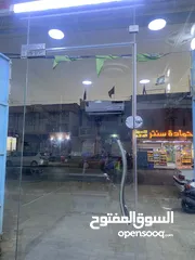  2 باب محل زجاج