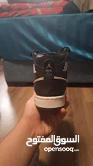  2 Nike Air jordans black and white