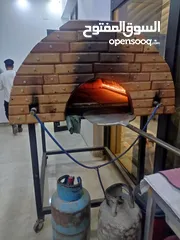  2 كوشه بيتزا حجرية