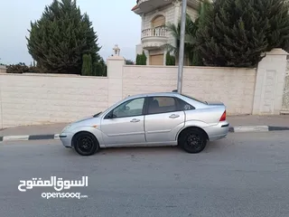  4 فورد فوكس 2006 اتماتك لعبه السياره بسعر حرق 18000 ألف نقدا جير ماتور نايلون ورق