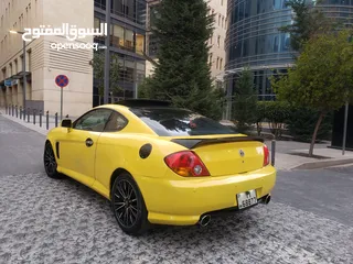  26 هونداي توسكاني شكل 2005 كامله الاضافات