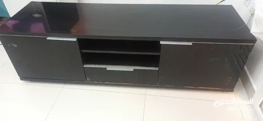  2 black color tv table