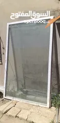  1 باب واجه باب محل المنيوم سحاب لون حليبي مقاس 2،80م ×2،30م