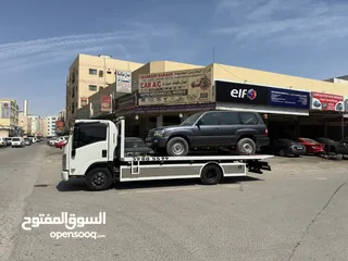  20 سطحة مدينة حمد 24  Hamad Town TOWING CAR 24  ونش  رافعة  رافعه  نقل  سطحة البحرين خدمات  سحب  سيارات