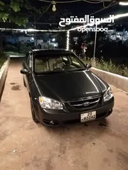  14 كيا سيراتو Kia cerato 2005