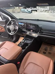  11 كيا سبورتاج هايبرد 2023 / فل كامل مع بانوراما وفرش مميز غرفه عسليه / عداد قليل / سعررر مميز جداً