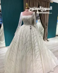  1 شروة مجموعة من بدل الابيض و الملون و فساتين السهرة