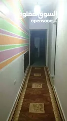  7 شقة أرضي وسط مع موقف تحت البناية