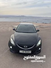  2 لون اسود ملوكي وارد خليجي Mazda zoom 6 2011