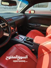  10 شالنجر srt8 موديل 2010  كاميرا خلفية شاشة فتحة سقف هيئة جديدة و المعاونيات والتواير و البطارية