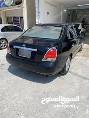  4 هيونداي افانتي xD لون اسود مميز ميتالك  موديل 2000