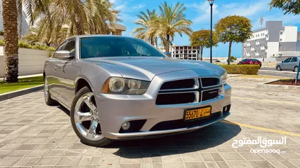  1 Dodge charger 2014 GCC, full options  6 cylinders, 3600cc very clean car