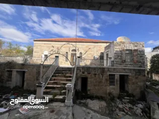  1 بيت قديم ومحلات للبيع