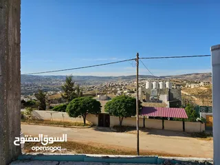  9 قطعة ارض مع بيت للبيع