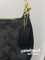  5 شنتة coach first copy  جلد باللون الأسود  للبيع