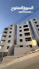  2 شقق طابقيه ارضيه  جديده فاخره في الزرقاء الجديده شارع الونك ( الكرامه )