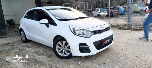  1 كيا برايد وبيجو با تنر