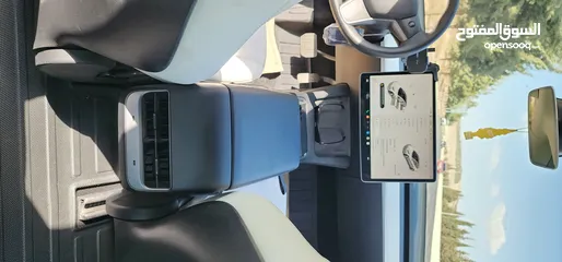  7 Tesla Model 3 Standerd Plus 2022 ابيض وداخليه ابيض جمرك جديد شهر 12‎ بسعر 20 الف بدون الرقم