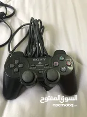  4 بلاي ستيشن 2وكالة مع اغراضه