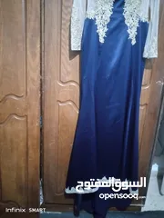  4 فستان سهرة كحلي ودهبي طويل