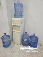  3 Water dispenser with 4 Almanhal/Nestle water bottles-30 BD