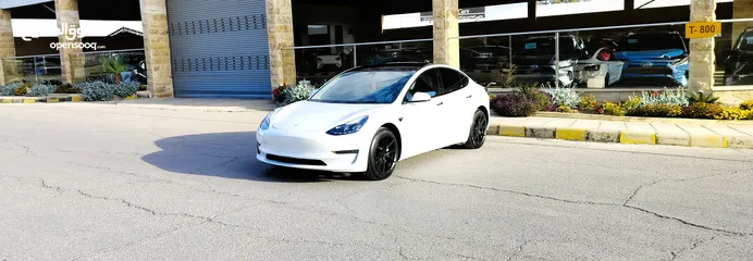 1 تيسلا 2022 model 3 بحالة الوكالة فحص كامل اوتوسكور +B لون مميز في الحرة للبيع بسعر لقطة ومحرووووق
