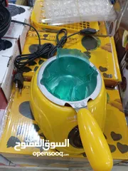  10 مكبس  بسكويت الوافل  و طنجرة تذويب شوكلاته او اعداد الخليط